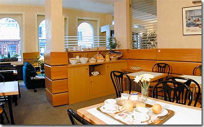 Photo 4 - Hotel Lyon Bastille Paris 3* star near the Gare de Lyon station - A breakfast buffet is served in our breakfast room - or in your guest room at no additional charge – from 6:30 am to 10:30 am during the week and from 7:00 am to 10:30 am during the weekend. Our menu includes hot beverages – tea, coffee and hot chocolate – baguettes, biscuits, a variety of pastries and jams, honey, cheeses, cottage cheese, a selection of cereals, ham, fruit juices, fruit salad and other selections.