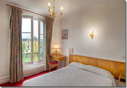 Photo 9 - Hotel du Quai Voltaire Paris 2* star near the Saint-Germain des Prés District, Left Bank - Small, cosy and sunlit, they are arranged in a traditional style with warm and cosy decor.