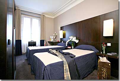 Photo 3 - Best Western Hotel Elysees Paris Monceau Parigi 3* stelle nei pressi degli Champs Elysées - Le camere dell'hotel presentano un design simile e offrono un piacevole compromesso tra lo stile moderno e quello antico.