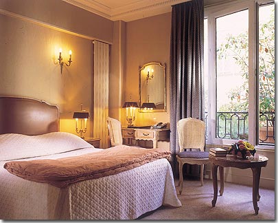 Photo 4 - Hotel Rochester Paris 4* star near the Champs Elysees - Our 90 rooms and suites, decorated in a Louis XV style, are offering high standard amenities : air conditioning, sound proofing, individual safety box, mini bar, television by satellite, & high speed internet connections.
All the bathrooms are in marble and equipped with bath, shower, and hair dryer.

Our “ Standard ” rooms are mainly situated on the inside garden, making the stay of our guests very quiet.