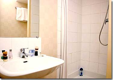 Photo 6 - Hotel Pavillon Opera Lafayette Paris 2* star near the Montmartre District and Garnier Opera - Our bathrooms are equipped with toilets, hairdryer and shower.