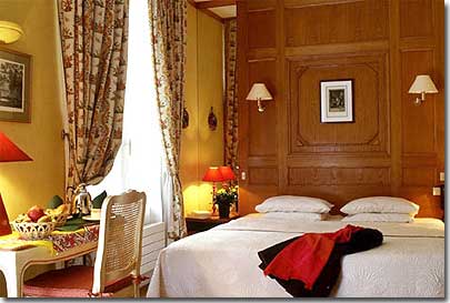 Photo 6 - Hotel de Fleurie Paris 3* star near the Saint-Germain des Prés District, Left Bank - All the rooms of the Fleurie Hotel have been renovated in a classical style and warm flowery tones. Charming family room. It can be arranged for families of four.