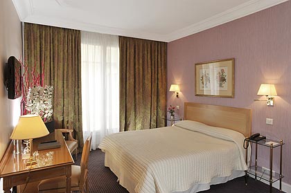 Photo 3 - Hotel Le Littré Paris 4* star near the Saint-Germain des Prés District, Left Bank - Montparnasse: The standard guest rooms.

The 215 square feet standard Montparnasse guest rooms are appointed in a classically French style and offer all the amenities of modern life.