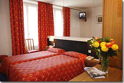 Photo 4 - Hotel de France Quartier Latin 2* Sterne Paris in der Nähe des Viertels Latin (Quartier Latin) und boulevard Saint Michel. - Im 2-Sterne Hotel de France stehen 30 Zimmer zur Auswahl, alle vollständig mit sanitären Einrichtungen, Fön, Bad / Dusche, Direktwahltelefon und Farbfernsehen ausgerüstet.