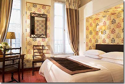 Photo 5 - Hotel Saint Paul Rive Gauche Paris 3* star near the Latin Quarter (Quartier Latin) and boulevard Saint Michel, Left Bank area - In each of the 31 rooms and suites of this 17th century dwelling the interior decorator has left his mark; no room resembles another. Some have four-poster beds; another has a ceiling with little twinkling lights and a Jacuzzi and, more, a still life deception. All the rooms have air-conditioning.